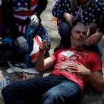 A man is being treated for his injuries after a brawl at a rally between conservatives and demonstrators against U.S. President Donald Trump in Berkeley