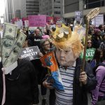 People march demanding President Donald Trump release his tax returns, in New York