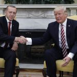 Turkey's President Erdogan shakes hands with U.S. President Trump in the Oval Office of the White House in Washington