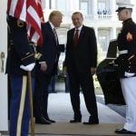 President Trump greets Turkey's President Erdogan at the entrance to the West Wing of the White House in Washington