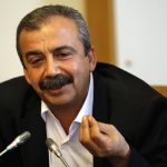 Pro-Kurdish politician of Peoples' Democratic Party Sirri Sureyya Onder addresses the media during a press conference in Ankara
