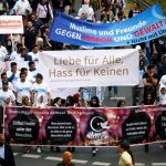 Muslims attend a rally to show solidarity against extremism, in Cologne