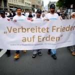 Muslims attend a rally to show solidarity against extremism, in Cologne