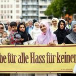 Muslims attend a rally to show solidarity against extremism, in Cologne