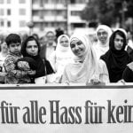 Muslims attend a rally to show solidarity against extremism, in Cologne