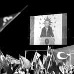 Turkish President Tayyip Erdogan is seen on the screen as he addresses his supporters in Istanbul