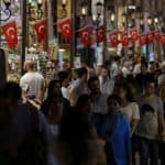 People shop in an old bazaar in Istanbul