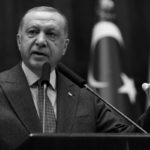 Turkish President Erdogan addresses members of his ruling AKP during a meeting at the parliament in Ankara