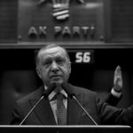 Turkish President Erdogan addresses members of his ruling AKP during a meeting at the parliament in Ankara