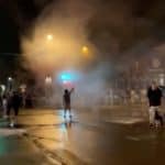 Still image shows police reportedly using tear gas and flash grenades against protesters demonstrating after the death of George Floyd in Minneapolis