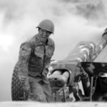 An ethnic Armenian soldier fires an artillery piece during fighting with Azerbaijan's forces in Nagorno-Karabakh