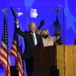 Nov 3, 2020; Wilmington, Delaware, USA; Democratic Party candidate Joe Biden and his wife Jill Biden speak to supporters on