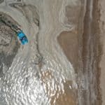 Aerial view of an almost deserted beach and sea snot in Istanbul