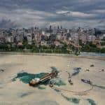 Sea-surface-cleaning vessels and barrier-laying boats of Istanbul Municipality clean up the sea snot in Istanbul