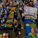People shop at a local market in Istanbul
