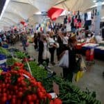 People shop at a local market in Istanbul
