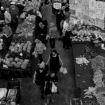 People shop at a local market in Istanbul