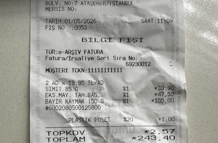 Turkish store receipt showing purchase items, prices, and total amount.