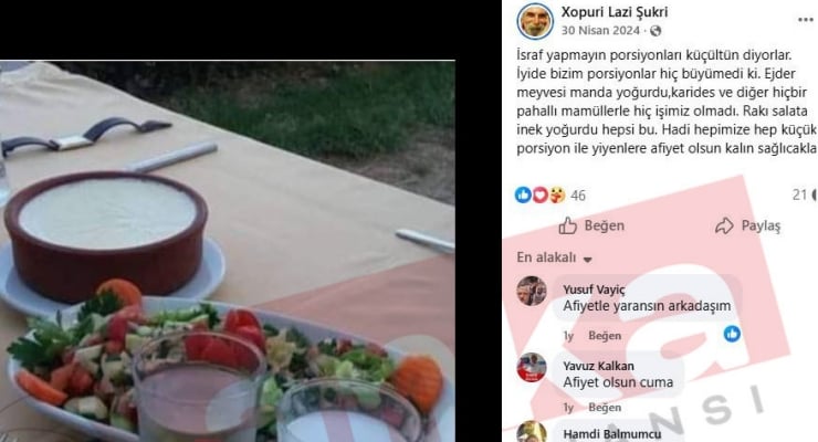 Outdoor table set for a meal: a large round red pot of yogurt-based dip and a plate of chopped salad with tomatoes, cucumbers, and carrot garnishes, outdoors with greenery in the background.