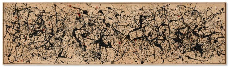 Abstract drip painting on tan canvas with dense black lines and scattered red spots across the frame.