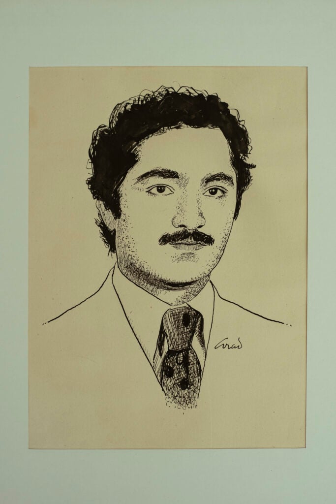 Line drawing of a man with dark hair and a mustache, wearing a suit and tie, black ink on beige paper.